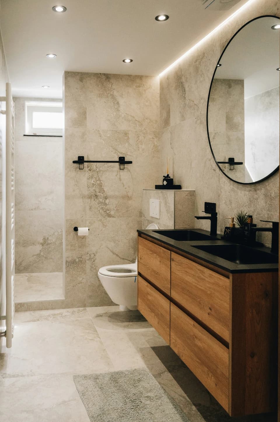 Bathroom vanity maintained by KM Fine Homes